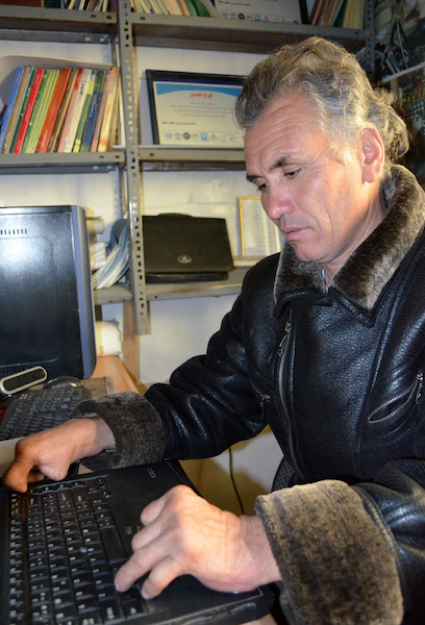 Man typing on computer keyboard section image