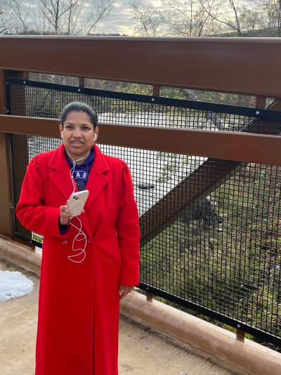 Photo of Testing Audio Description: Ph.D. researcher Sajja Koirala at Cuyahoga Valley National Park in Ohio (2023)